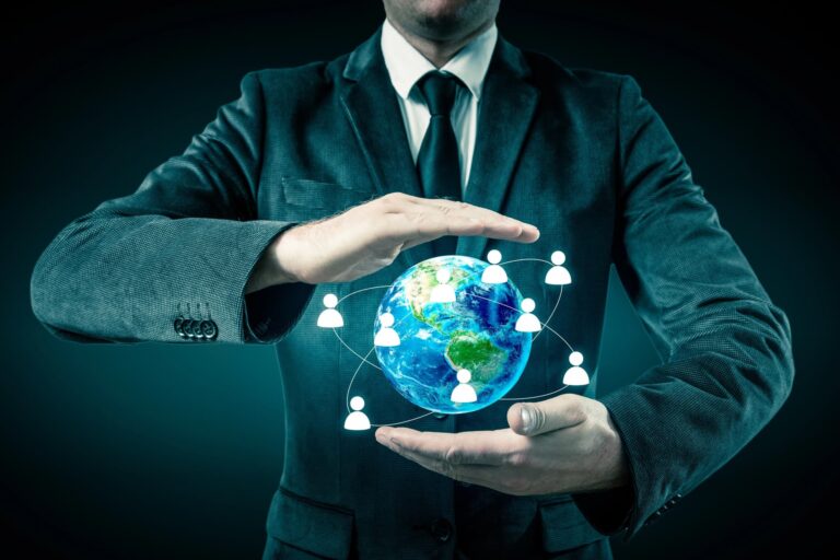 Businessman holding a globe, representing debt consultant insights for Canadian lawyers, accountants, mortgage brokers, LITs and realtors assisting clients in financial strain