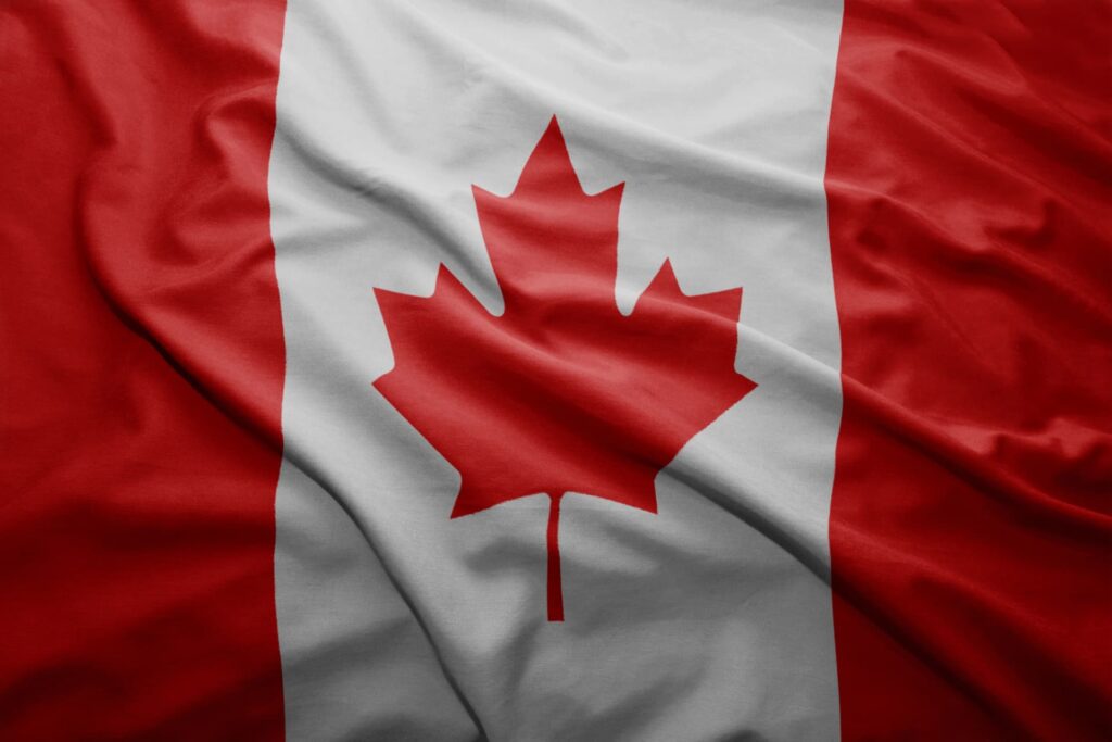 Canadian flag representing help for Canadian businesses facing CRA garnishments and bank account freezes due to tax debt